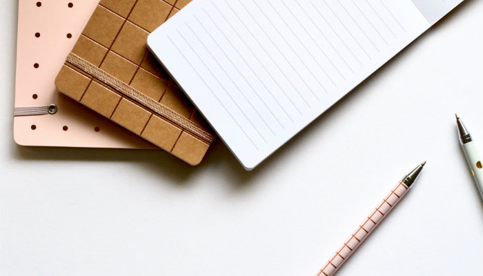 Libretas con ideas de cómo desarrollar tu negocio.