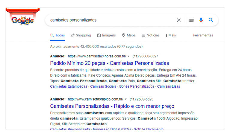 captura de tela do termo camisetas personalizadas na pesquisa do Google, exemplificando a campanha de rede de pesquisa do Google Anúncio