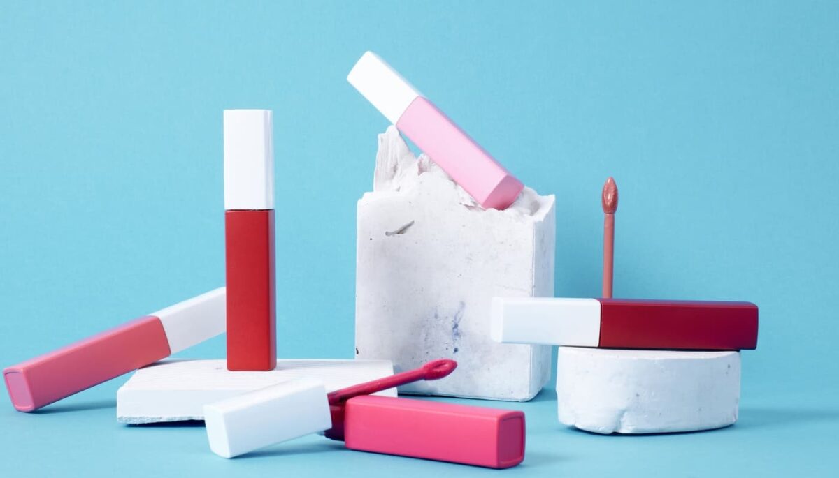 Imagem de embalagens de gloss labial simbolizando como fazer gloss para vender