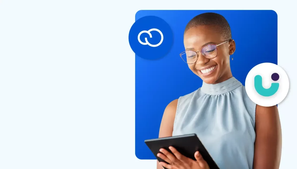 Nuvemshop ou Loja Integrada: qual escolher em 2025? Jovem empreendedora posa para a foto mexendo no celular, supostamente conferindo uma loja virtual. Em destaque, vemos os logos de plataformas de ecommerce, demonstrando a escolha entre Nuvemshop ou Loja Integrada